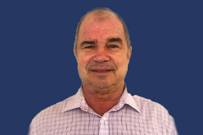 Head shot of Jorge Badel, Community Engagement Director at American Golf Corporation
